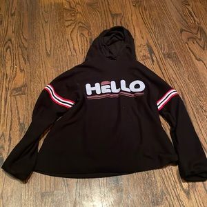 Girls revelation black top with hood.